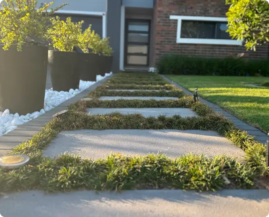 Landscaped walkway to a home entrance